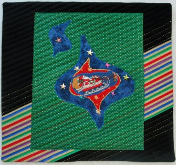 Santa's Night-time Trek. rayon & metallic on cotton, 12" x 11", © 2013, Joni Beach. Appliqued and free-motion quilting. 